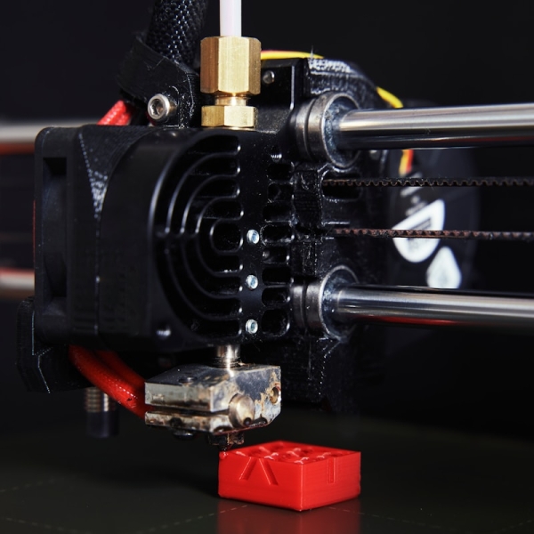 a close up of a machine with wires attached to it